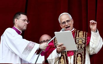 Cardinal Robert Francis Prevost, who has chosen the papal name Leo XIV, speaks on the central balcony of St. Peter's Basilica at the Vatican May 8, 2025, following his election during the conclave. He is the first American pope in history.