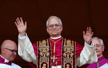 Cardinal Robert Francis Prevost, who has chosen the papal name Leo XIV, appears on the central balcony of St. Peter's Basilica at the Vatican May 8, 2025, following his election during the conclave. He is the first American pope in history.