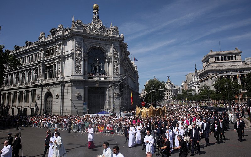 Pope Leo XIV holds the monstrance as he leads the Corpus Christi procession at Plaza de Cibeles in Madrid June 7, 2026, during his apostolic journey to Spain