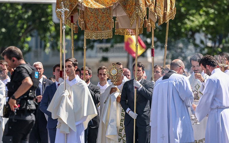 Pope Leo XIV carries the monstrance as he leads the Corpus Christi procession at Plaza de Cibeles in Madrid June 7, 2026, during his apostolic journey to Spain.