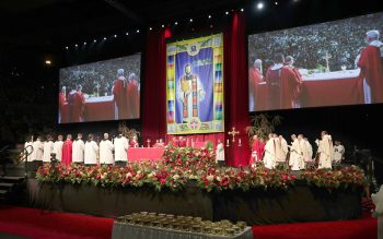 Clergymen concelebrate Mass during the beatification Mass for Father Stanley Rother Sept. 23, 2017, at Oklahoma City's Cox Convention Center.