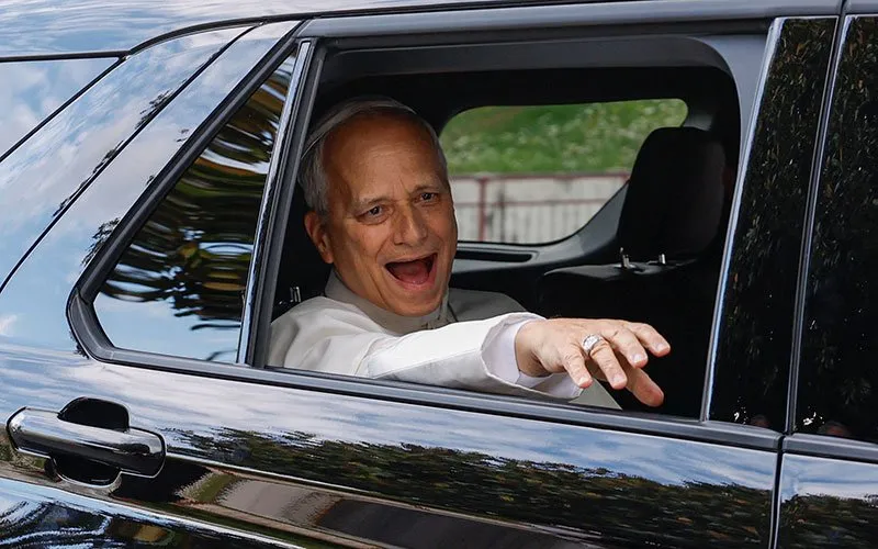Pope Leo XIV sits in a car and smiles as he leaves Gemelli Hospital following his lung surgery and cancer diagnosis, in Rome, Oct. 17, 2026.