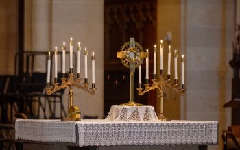 A monstrance on an altar.