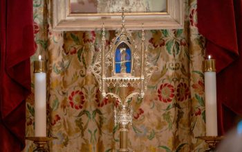 A relic is seen on an altar.